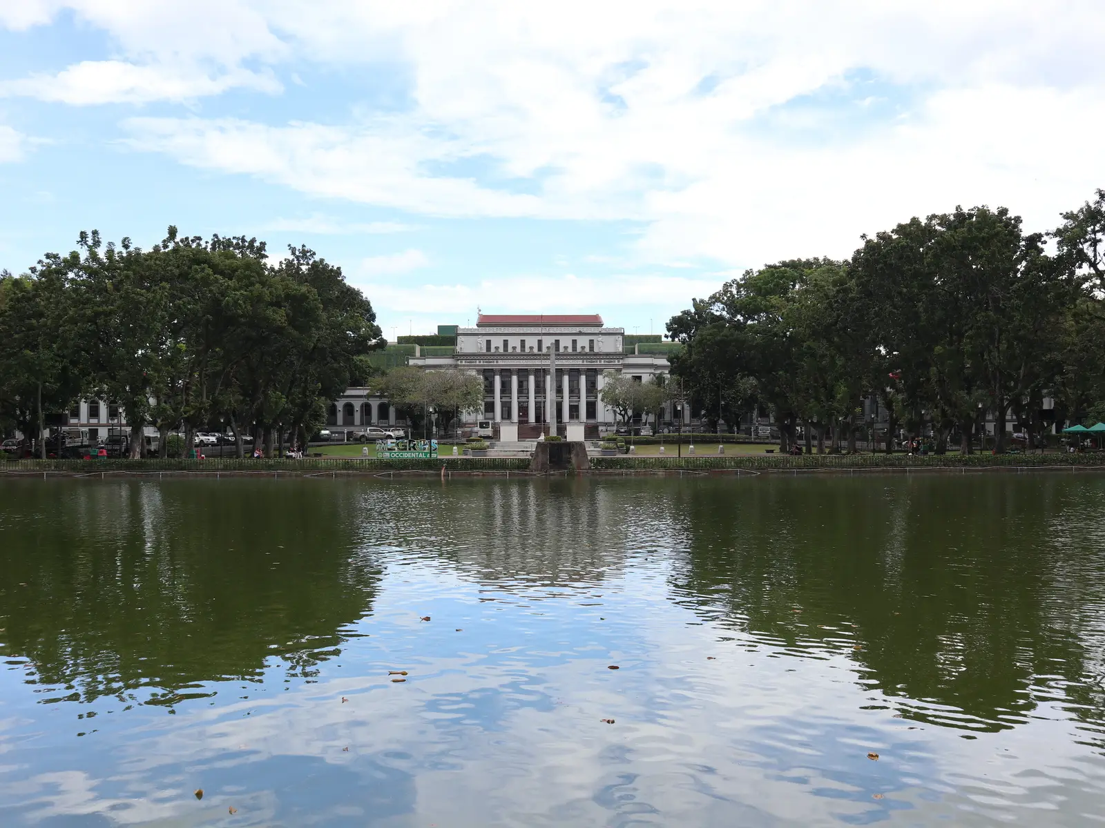 Negros Occidental Provincial Capitol reflected in the Capitol lagoon in Bacolod, Negros Occidental